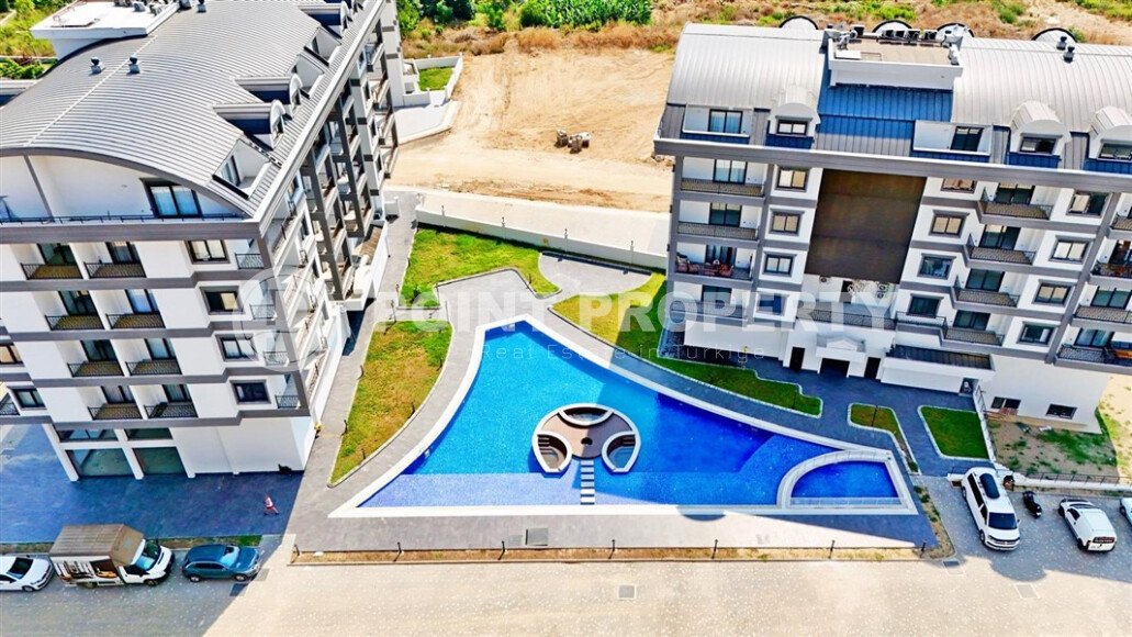 Светлая квартира 60 м² в современном комплексе, недалеко от моря, район Каргыджак-id-10740-фото-26