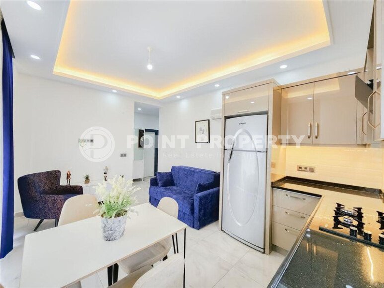 Солнечная квартира 1+1 50 м² в район Авсаллар с видом на горы и бассейн-id-10746-фото-1