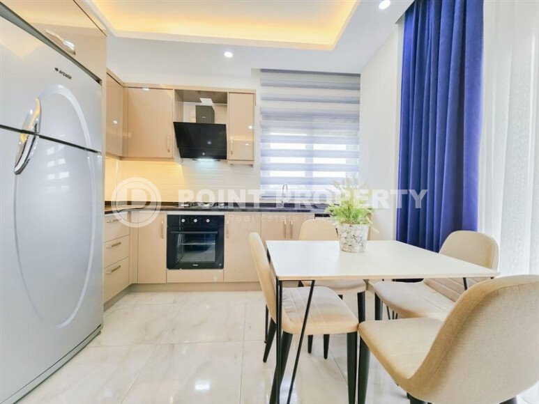 Солнечная квартира 1+1 50 м² в район Авсаллар с видом на горы и бассейн-id-10746-фото-4