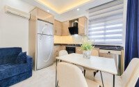 Солнечная квартира 1+1 50 м² в район Авсаллар с видом на горы и бассейн-id-10746-фото-5