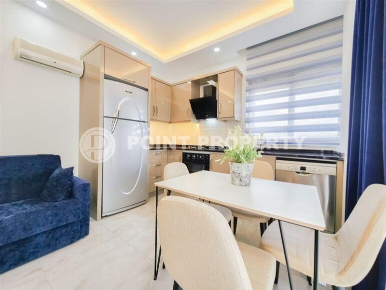 Солнечная квартира 1+1 50 м² в район Авсаллар с видом на горы и бассейн-id-10746-фото-5