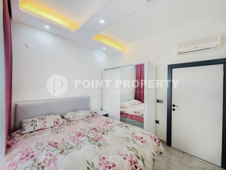 Солнечная квартира 1+1 50 м² в район Авсаллар с видом на горы и бассейн-id-10746-фото-6