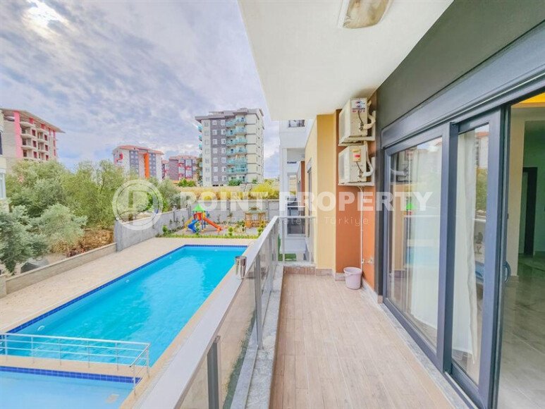 Солнечная квартира 1+1 50 м² в район Авсаллар с видом на горы и бассейн-id-10746-фото-14