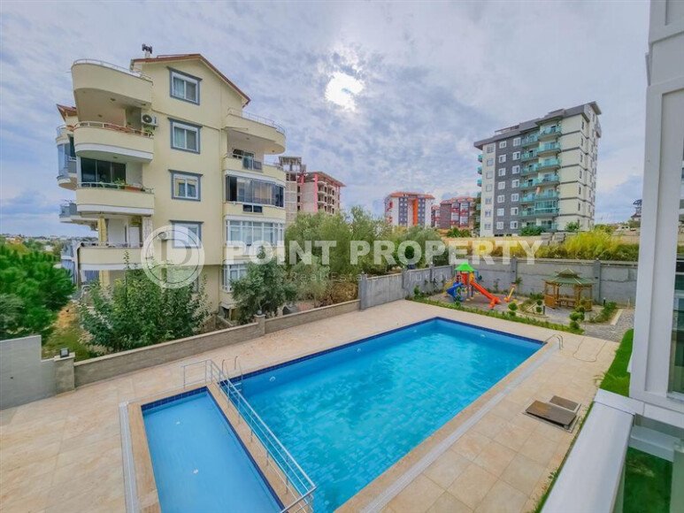 Солнечная квартира 1+1 50 м² в район Авсаллар с видом на горы и бассейн-id-10746-фото-15