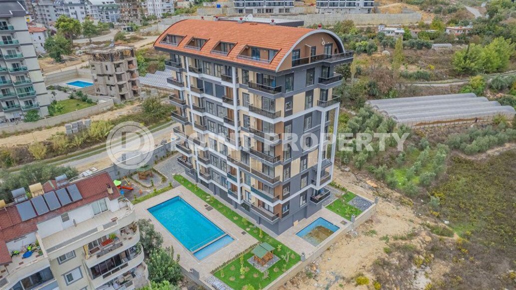 Солнечная квартира 1+1 50 м² в район Авсаллар с видом на горы и бассейн-id-10746-фото-17