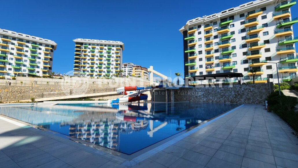 Современная квартира 55 м² в районе Авсаллар, новый комплекс-id-10750-фото-17