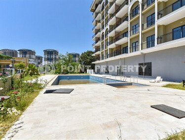 Светлая новая квартира 45 м² в районе Авсаллар-id-10751-фото-3