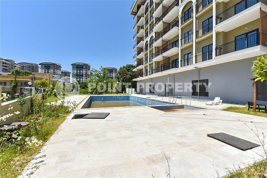 Светлая новая квартира 45 м² в районе Авсаллар-id-10751-фото-1