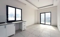 Светлая новая квартира 45 м² в районе Авсаллар-id-10751-фото-4