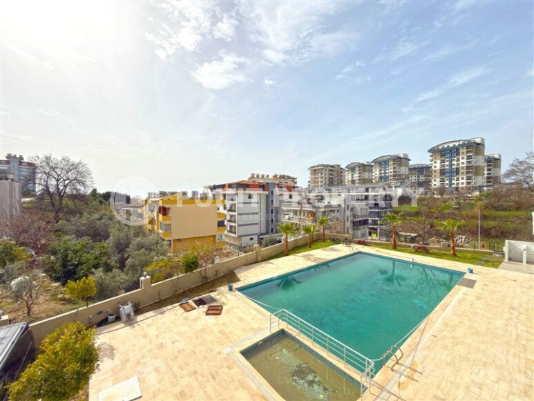 Светлая новая квартира 45 м² в районе Авсаллар-id-10751-фото-9