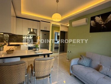 Panoramic apartment 55 m² with mountain views in Mahmutlar area-id-10765-photo-1