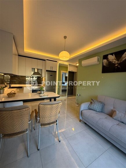 Panoramic apartment 55 m² with mountain views in Mahmutlar area-id-10765-photo-1