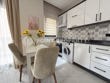 Современная квартира 1+1, 45 м² в районе Махмутлар-id-10766-фото-2