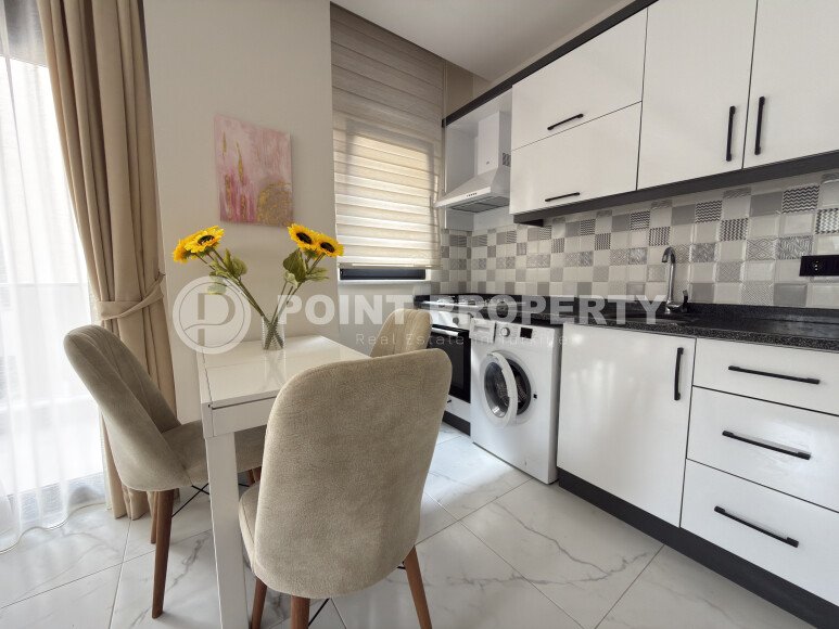 Современная квартира 1+1, 45 м² в районе Махмутлар-id-10766-фото-2