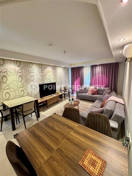 Комфортабельные апартаменты 110 м² с двумя санузлами и частичным видом на море в районе Махмутлар-id-10768-фото-4