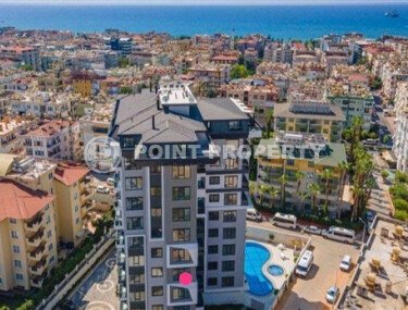 Modern 90 m² apartment with a separate kitchen in the center of Alanya in a new residential complex-id-10773-photo-1