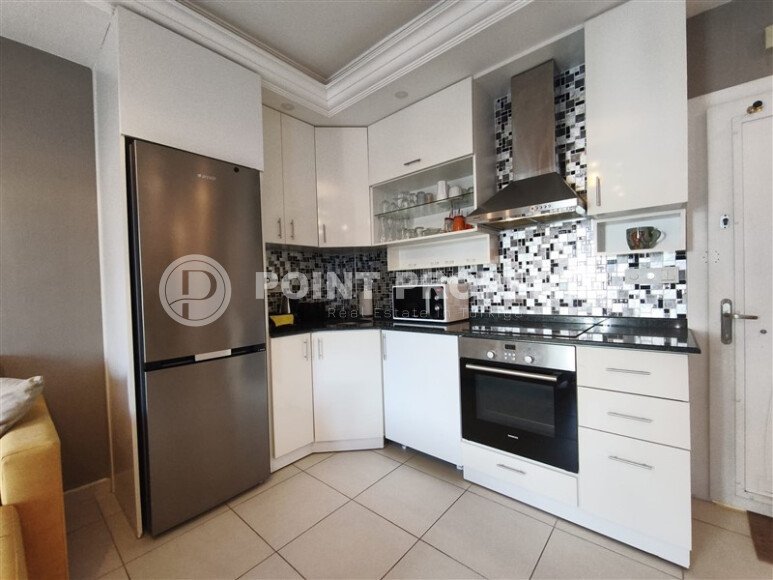 Элегантные апартаменты 60 м² с застеклённым балконом в центре района Оба, недалеко от моря-id-10776-фото-7