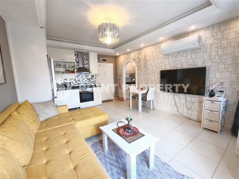 Элегантные апартаменты 60 м² с застеклённым балконом в центре района Оба, недалеко от моря-id-10776-фото-3