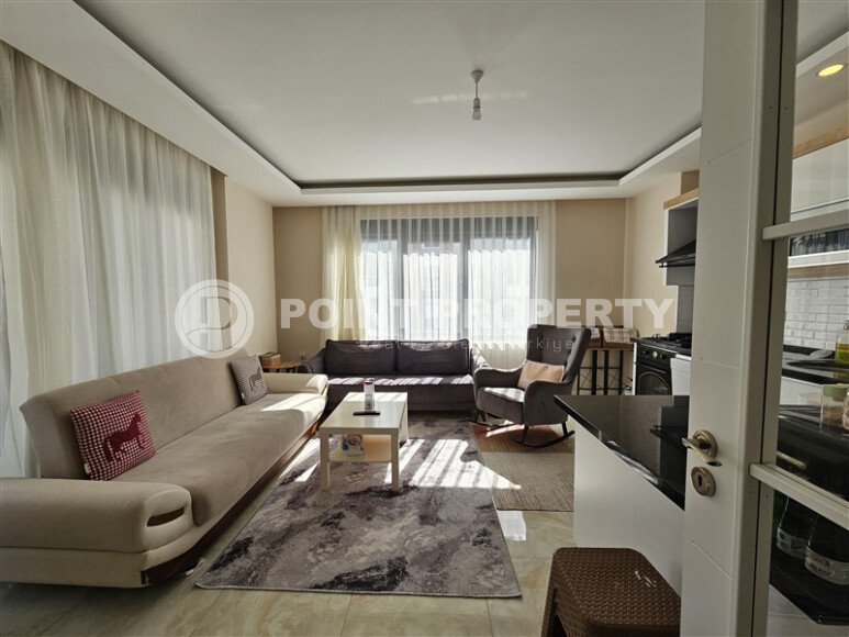 Солнечные апартаменты 55 м² с панорамными окнами и уютным угловым балконом в районе Тосмур-id-10777-фото-1