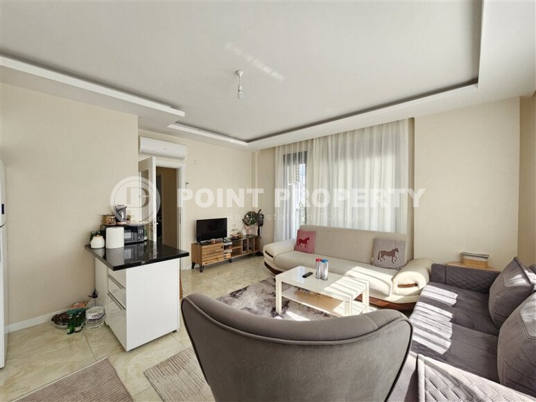 Солнечные апартаменты 55 м² с панорамными окнами и уютным угловым балконом в районе Тосмур-id-10777-фото-4