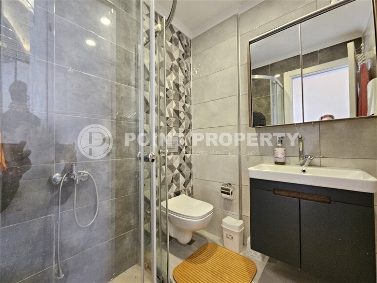 Солнечные апартаменты 55 м² с панорамными окнами и уютным угловым балконом в районе Тосмур-id-10777-фото-9