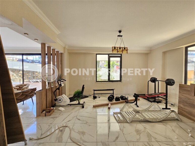 Солнечные апартаменты 55 м² с панорамными окнами и уютным угловым балконом в районе Тосмур-id-10777-фото-13