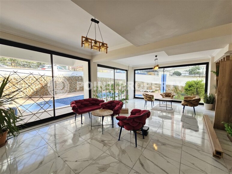 Солнечные апартаменты 55 м² с панорамными окнами и уютным угловым балконом в районе Тосмур-id-10777-фото-18