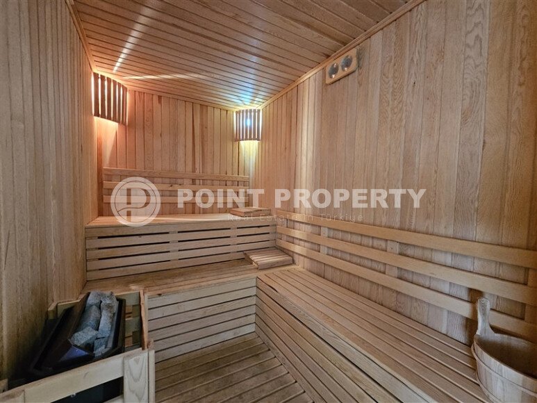 Солнечные апартаменты 55 м² с панорамными окнами и уютным угловым балконом в районе Тосмур-id-10777-фото-19