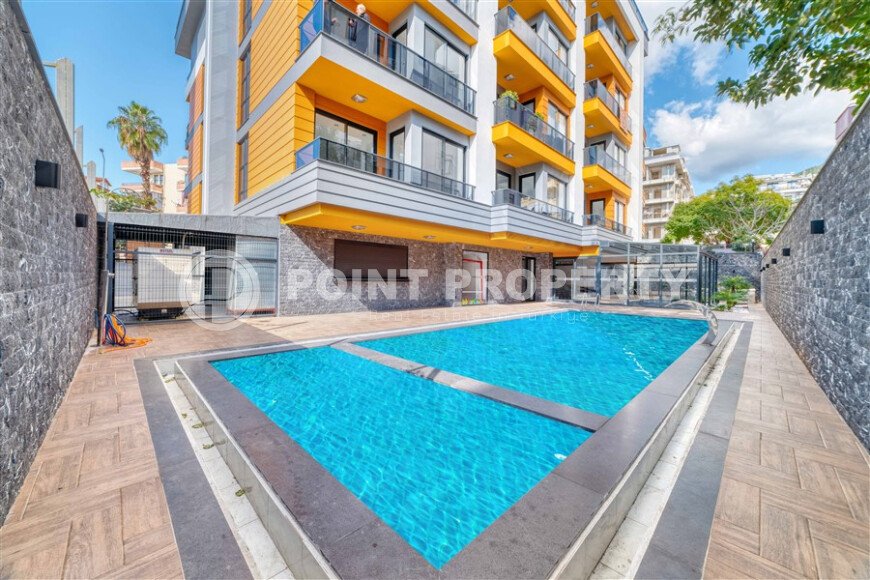 Светлые апартаменты 1+1 в престижном комплексе в центре Аланьи-id-10778-фото-1