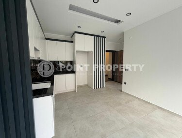 Светлые апартаменты 1+1 в престижном комплексе в центре Аланьи-id-10778-фото-3