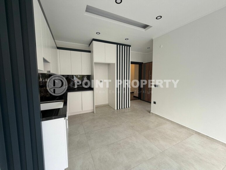 Светлые апартаменты 1+1 в престижном комплексе в центре Аланьи-id-10778-фото-3