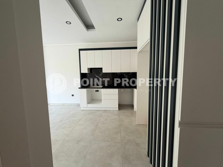 Светлые апартаменты 1+1 в престижном комплексе в центре Аланьи-id-10778-фото-4