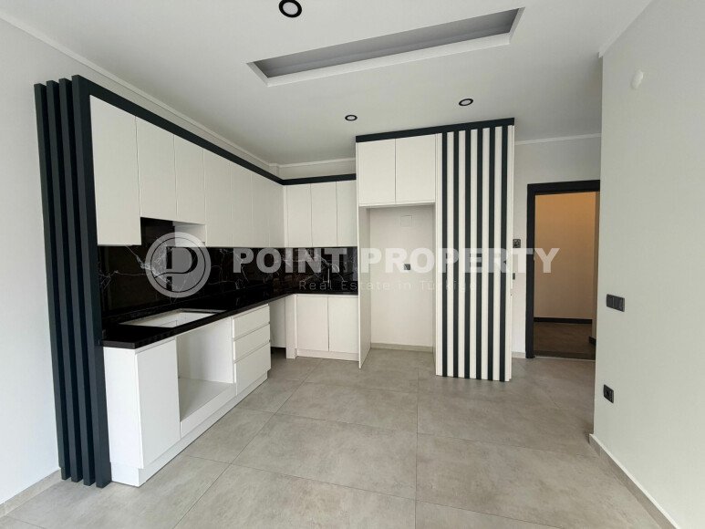 Светлые апартаменты 1+1 в престижном комплексе в центре Аланьи-id-10778-фото-5