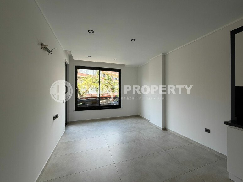 Светлые апартаменты 1+1 в престижном комплексе в центре Аланьи-id-10778-фото-6