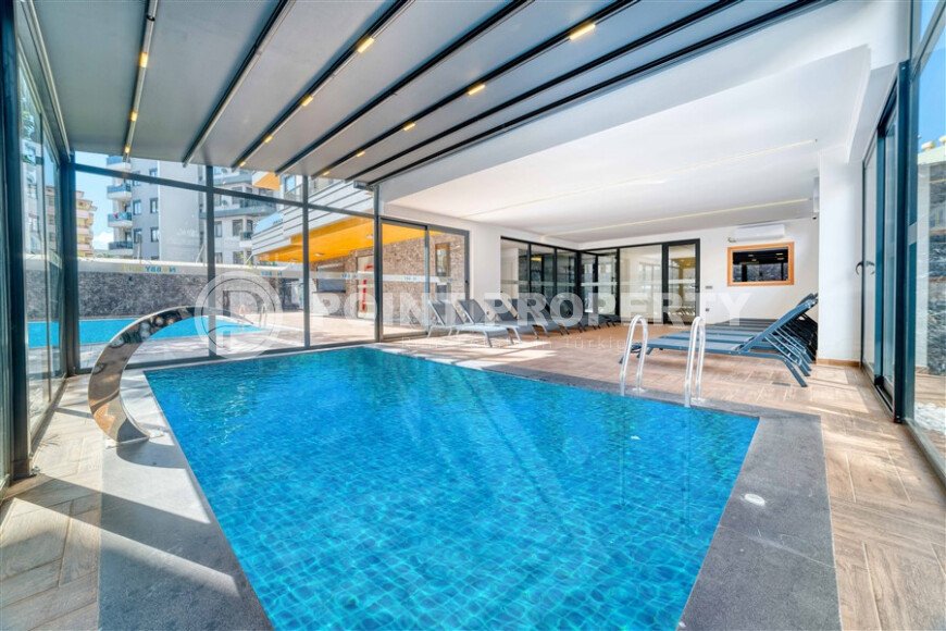 Светлые апартаменты 1+1 в престижном комплексе в центре Аланьи-id-10778-фото-17