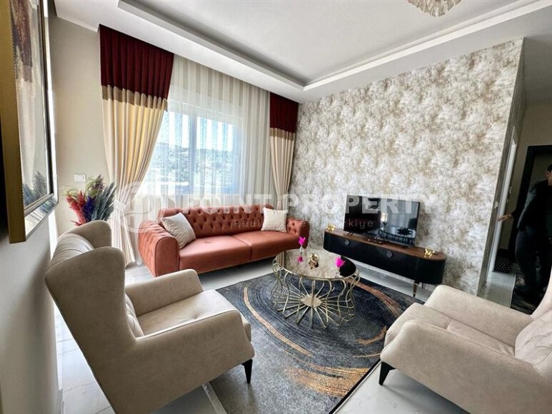 Яркая квартира 1+1 в районе Каргыджак с панорамным видом на горы и окрестности-id-10780-фото-1