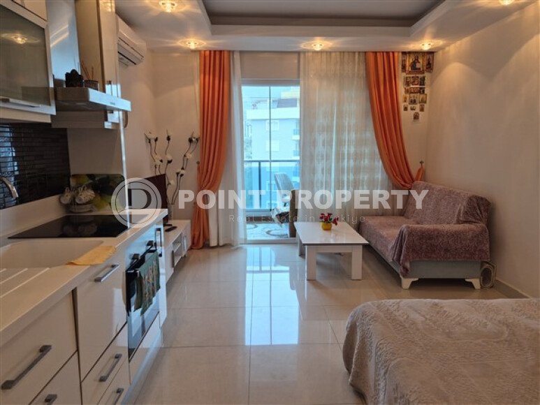 Уютная студия 0+1 в районе Махмутлар с застекленным балконом и видом на горы-id-10781-фото-2