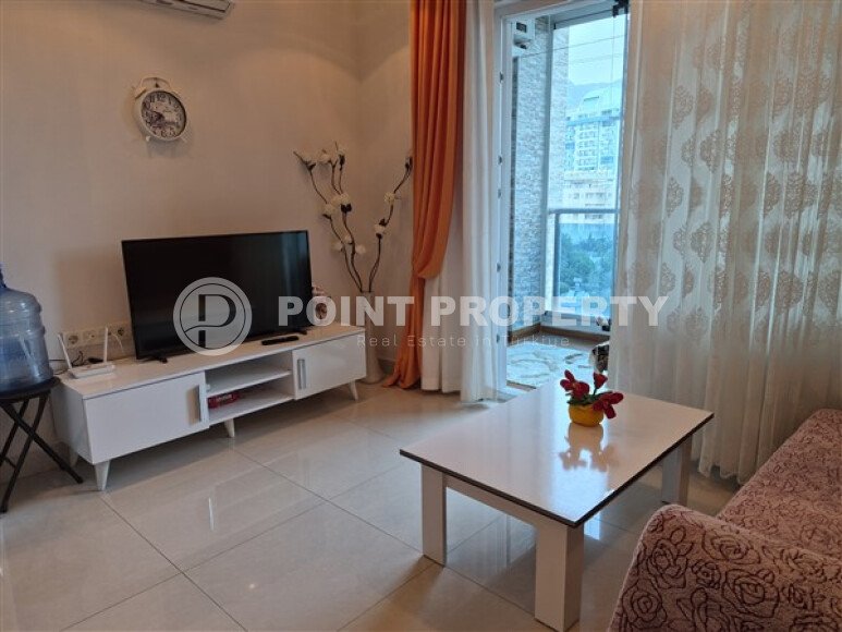 Уютная студия 0+1 в районе Махмутлар с застекленным балконом и видом на горы-id-10781-фото-3