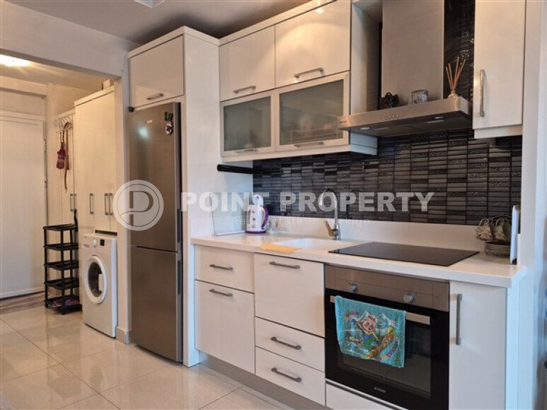 Уютная студия 0+1 в районе Махмутлар с застекленным балконом и видом на горы-id-10781-фото-4