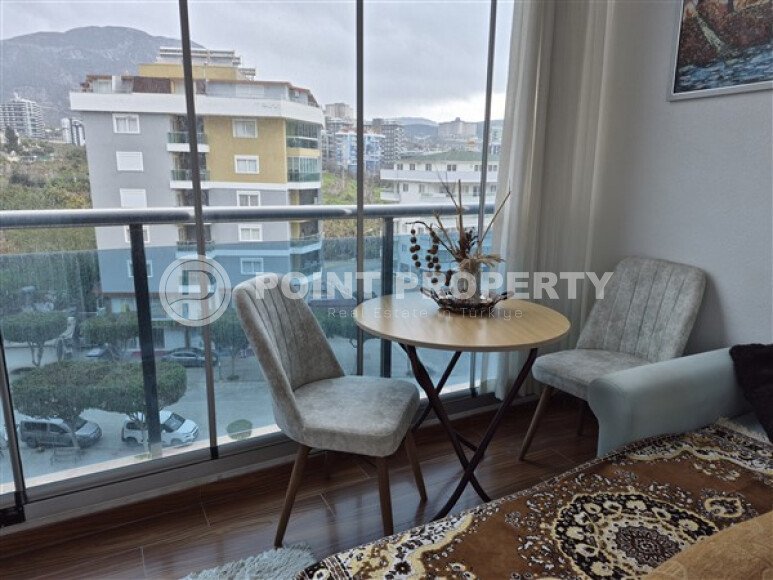 Уютная студия 0+1 в районе Махмутлар с застекленным балконом и видом на горы-id-10781-фото-7