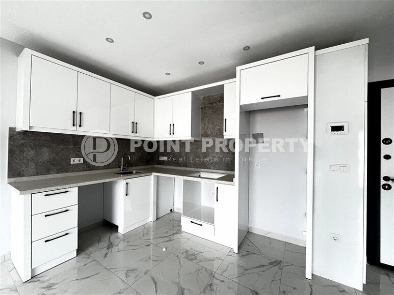 Современные апартаменты 50 м² в районе Тосмур в новом комплексе-id-10783-фото-2