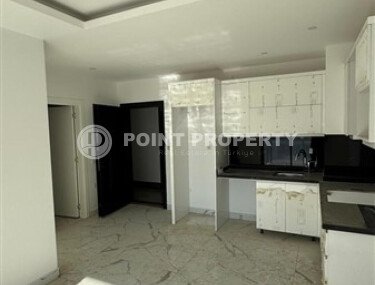 A bright 51 m² apartment in the Mahmutlar area in a complex with hotel infrastructure-id-10784-photo-2