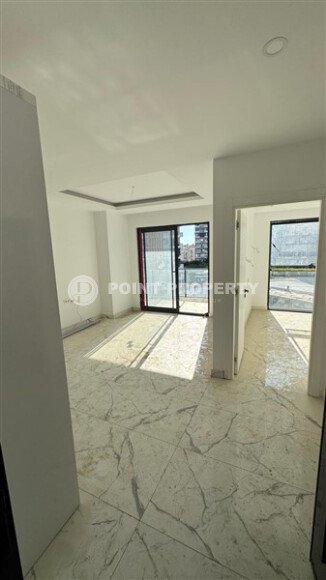 Светлая квартира 51 м² в районе Махмутлар в комплексе с отельной инфраструктурой-id-10784-фото-11