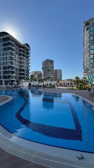 Светлая квартира 51 м² в районе Махмутлар в комплексе с отельной инфраструктурой-id-10784-фото-17