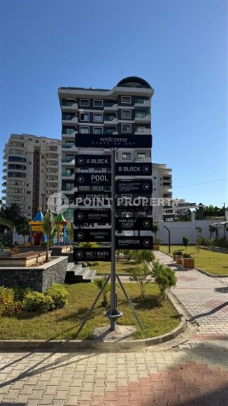 Светлая квартира 51 м² в районе Махмутлар в комплексе с отельной инфраструктурой-id-10784-фото-29