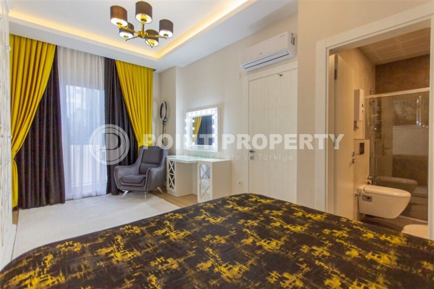 Stylish 200 m² apartment in Mahmutlar with a separate kitchen, close to the sea-id-10800-photo-9