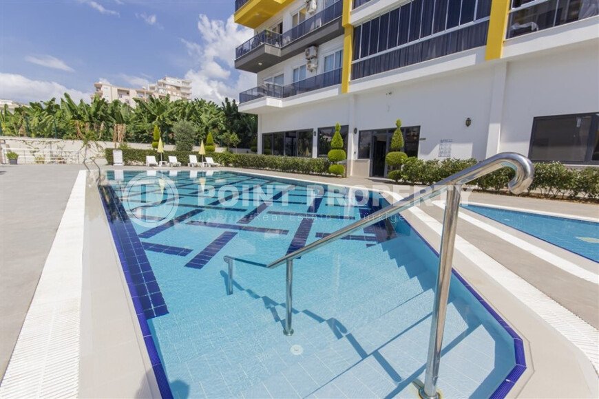 Stylish 200 m² apartment in Mahmutlar with a separate kitchen, close to the sea-id-10800-photo-24