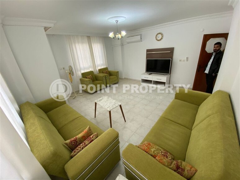 Mahmutlar district, 2+1 apartment, 90 m² in a complex built in 2000, furnished, located 450 m from the sea and 100 m from the center of the district.-id-10806-photo-2