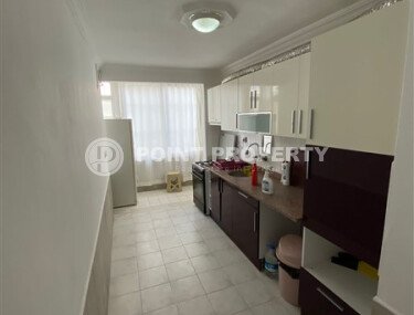 Район Махмутлар, квартира 2+1 площадью 90 м² в комплексе 2000 года постройки, меблированная, расположена в 450 м от моря и в 100 м от центра района.-id-10806-фото-4