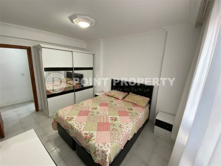 Mahmutlar district, 2+1 apartment, 90 m² in a complex built in 2000, furnished, located 450 m from the sea and 100 m from the center of the district.-id-10806-photo-7